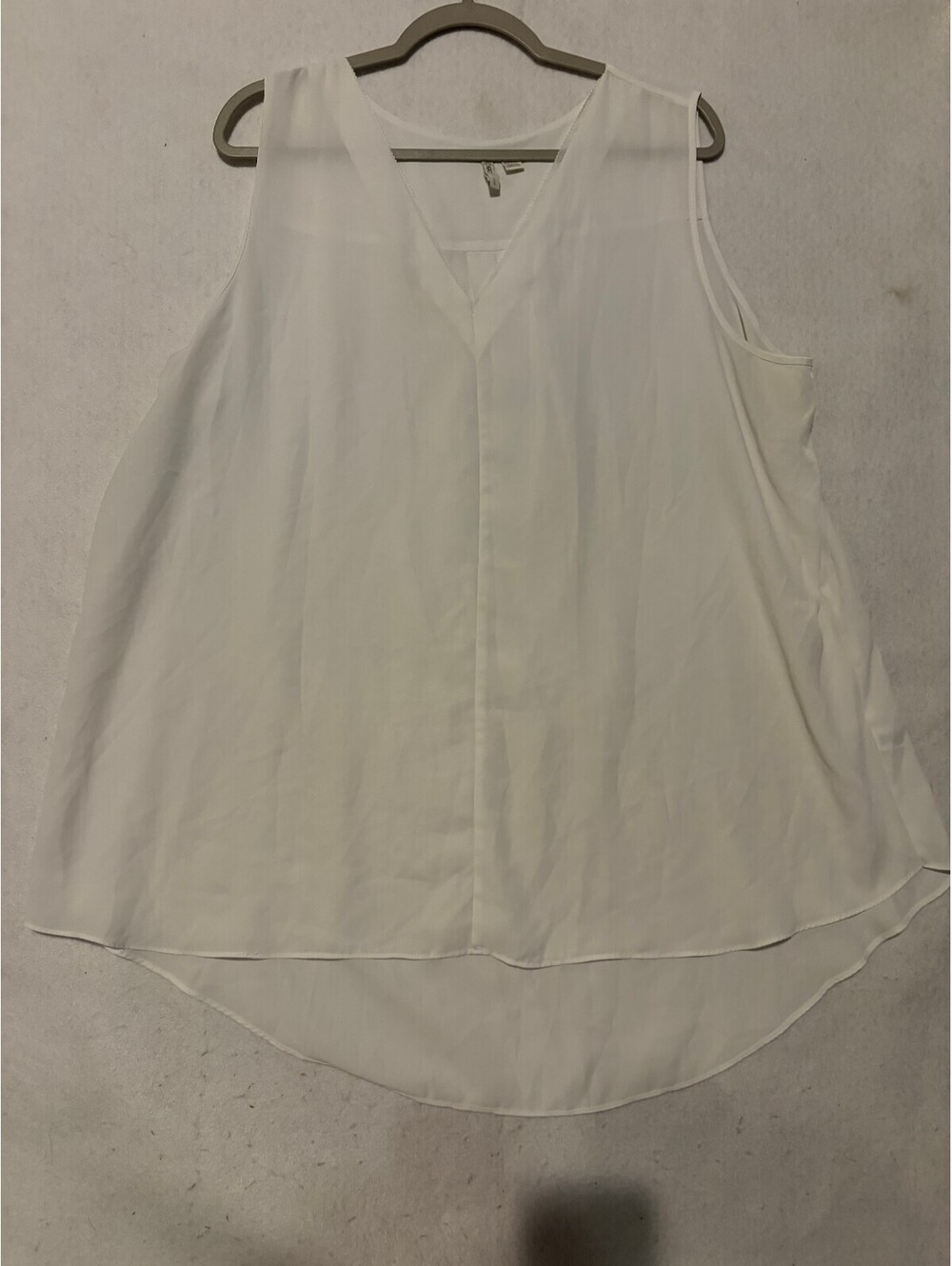 White Sleeveless V-Neck Blouse with High-Low Hem size 22-24